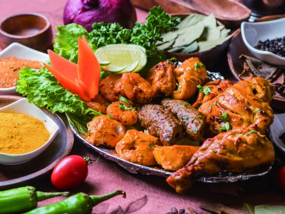 An assortment of fish, chicken and lamb kebabs on a platter, a signature dish from Muslim-owned restaurants. (Photo・Ali Baba's Indian Kitchen)